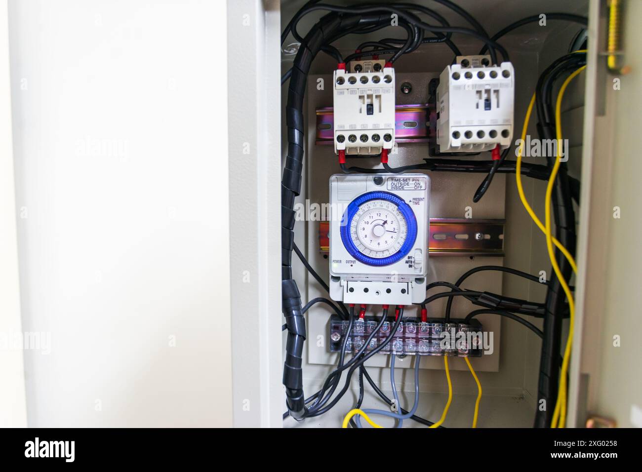 Electrical cabinet timer used to power large electrical equipment Stock ...