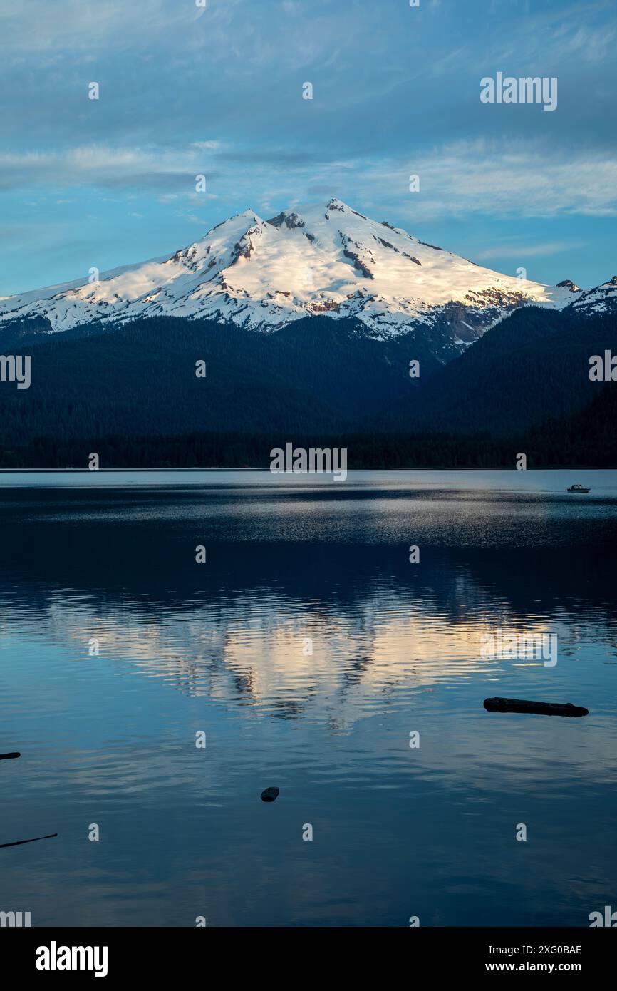 WA25493-00...WASHINGTON - Early morning light on Mount Baker, reflected in Baker Lake. Stock Photo