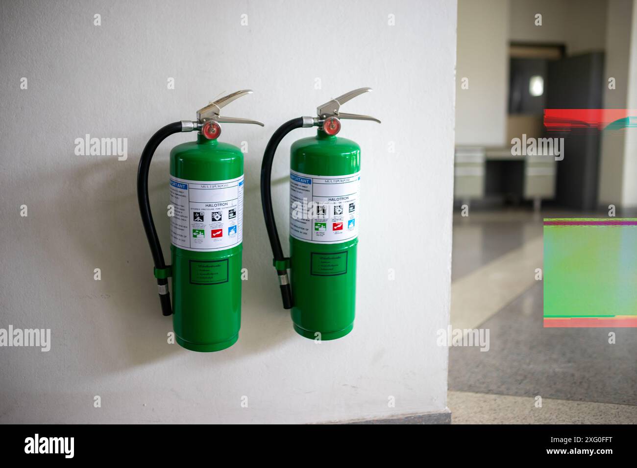 A large fire extinguisher was set up in the server room for enhanced safety. Stock Photo