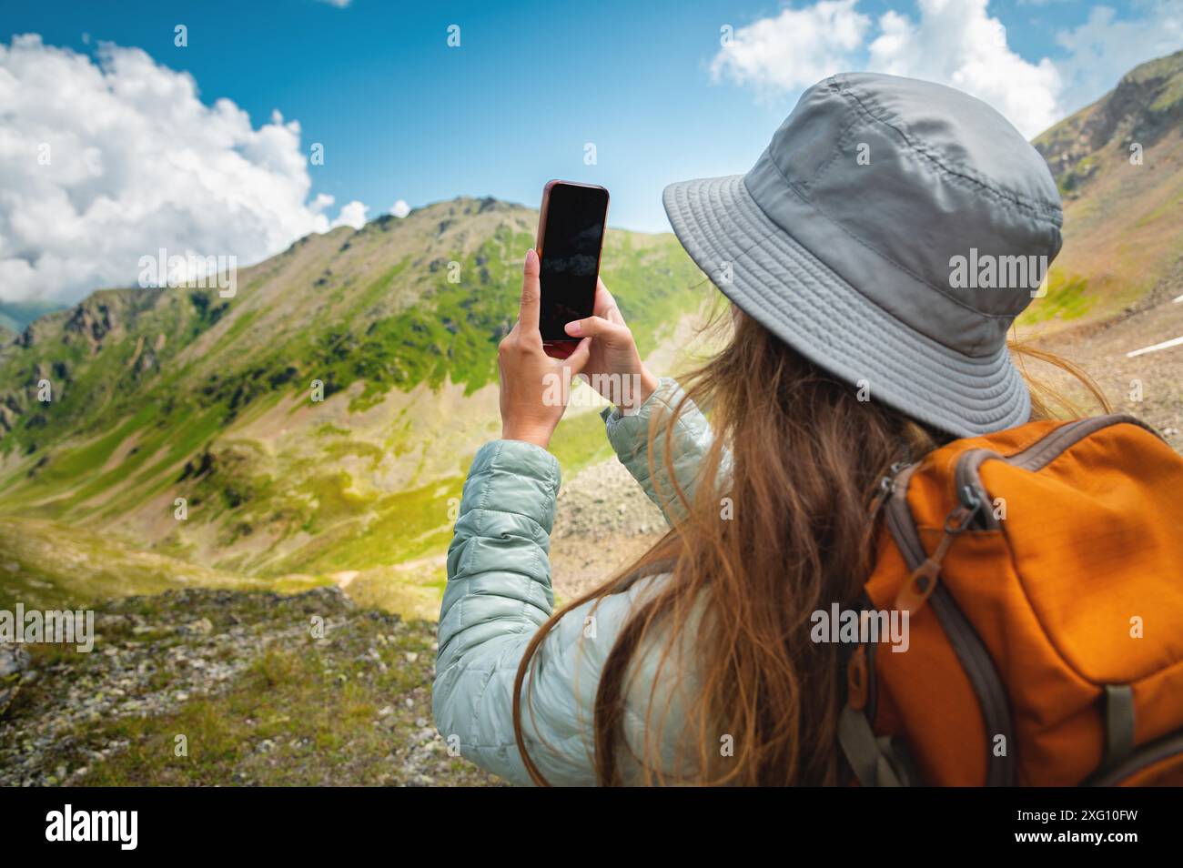Smiling hiker girl taking selfie hi-res stock photography and images ...