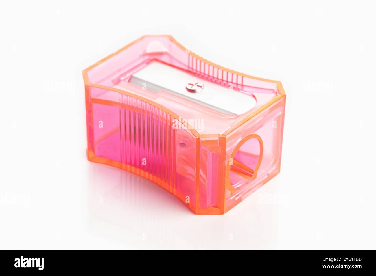 Pink pencil sharpener isolated on white background Stock Photo