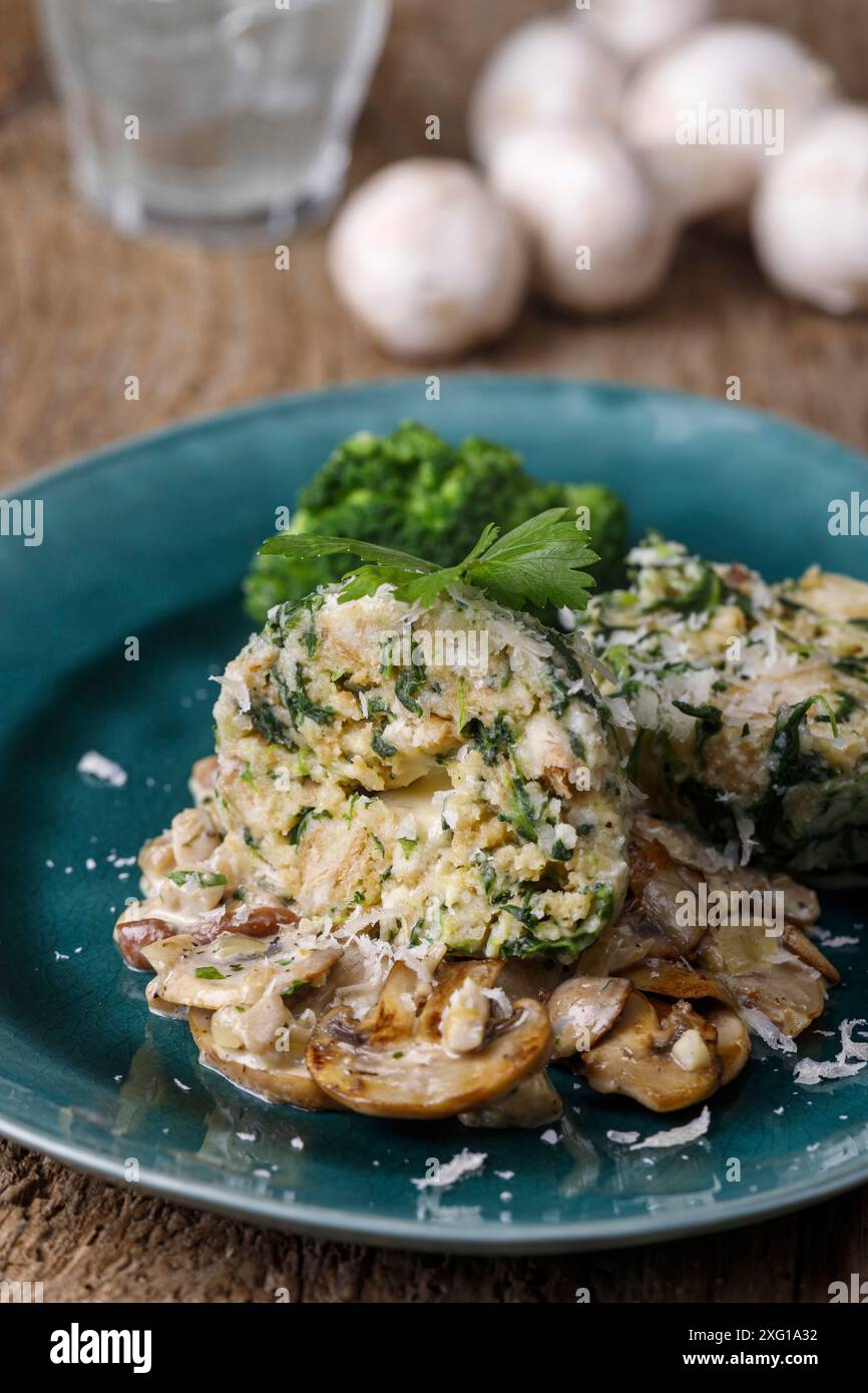 Stuffed dumplings with mushroom sauce Stock Photo