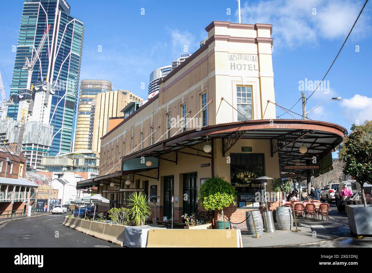 The Australian heritage hotel public house in the Rocks area of Sydney city centre with office skyscraper and EY building,Sydney,NSW,Australia Stock Photo