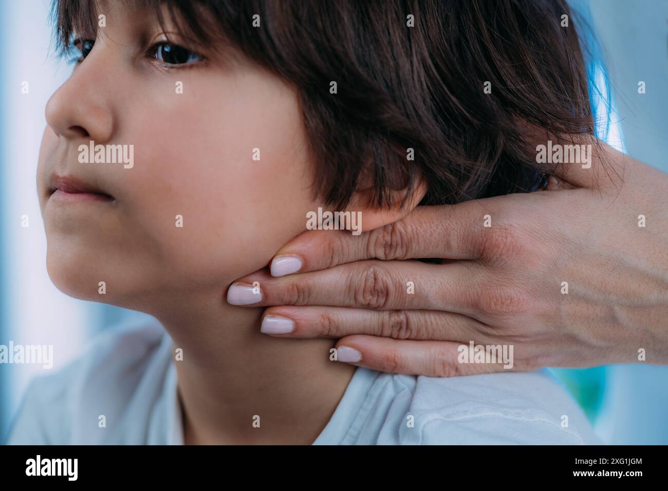 Paediatric Endocrinologist Examining A Young Boy Stock Photo - Alamy