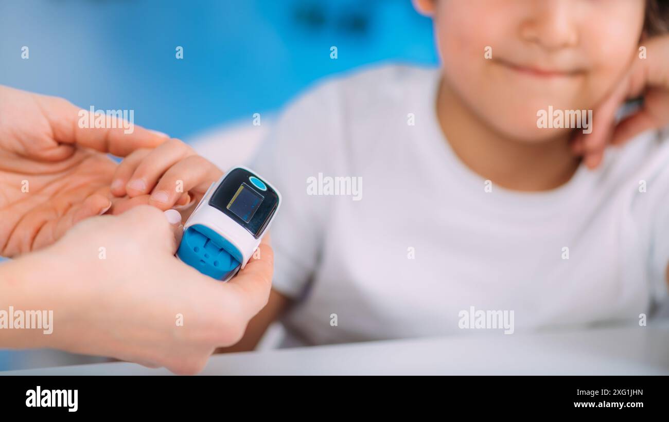 Normal O2 For Pediatrics Pulmonology pediatrician measuring blood oxygen levels with pulse ...