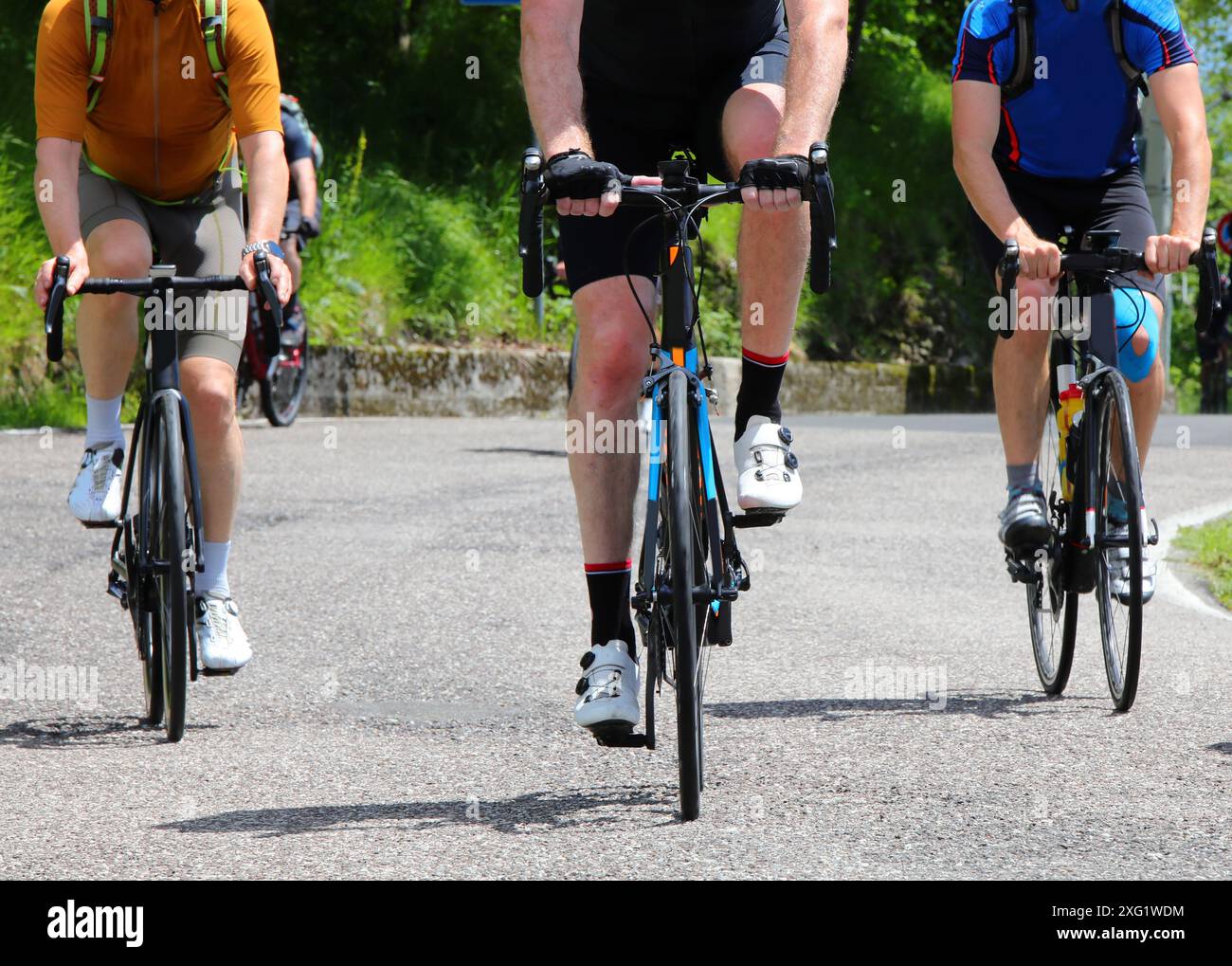 Three Bikes Racing 3 three cyclists riding bikes hi-res stock photography and images - Alamy