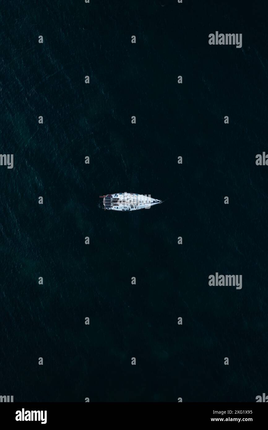 Aerial view to sailing yacht in the sea Stock Photo - Alamy
