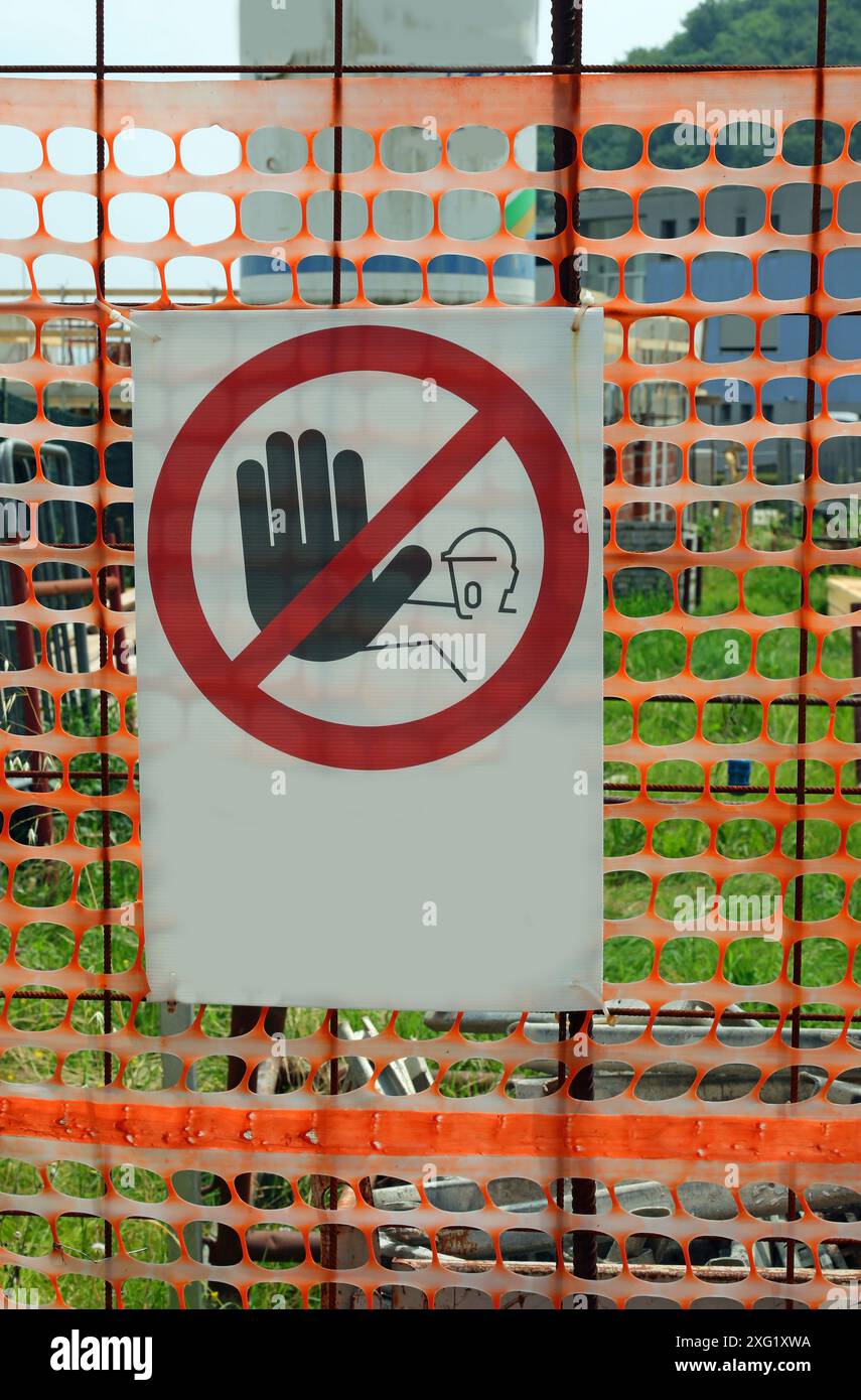 site sign without text warning unauthorized personnel to stay out ...