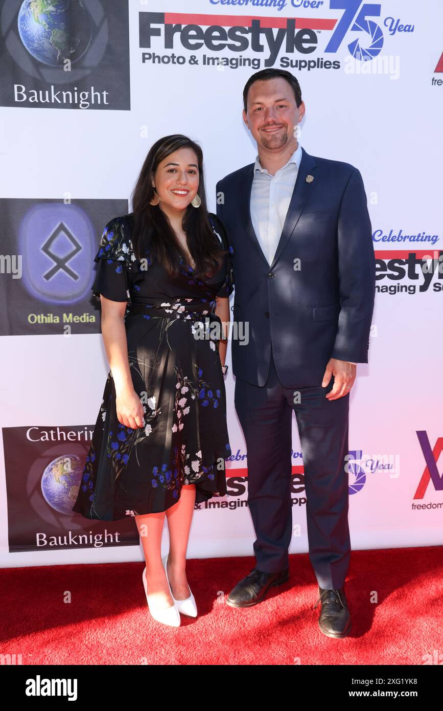 Burbank, California, USA. 5th July, 2024. Nick Schultz, Mayor of Burbank, and Nikki Perez, Vice Mayor of Burbank, attending the Catherine Bauknight 'All One World' Photography Exhibition at the Betsy Lueke Creative Arts Gallery in Burbank, California. Credit: Sheri Determan Stock Photo