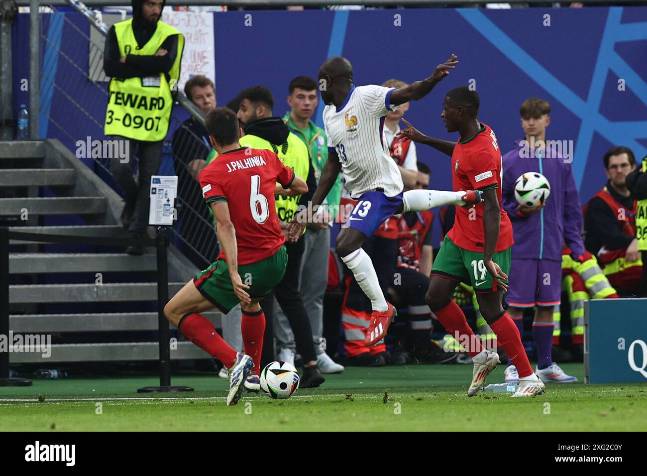 Joao Palhinha (Portugal)N Golo Kante (France) Nuno Mendes (Portugal) during the UEFA Euro Germany 2024 match between Portugal 4-5 France at Volkspakstadion on July 05, 2024 in Hamburg, Germany. Credit: Maurizio Borsari/AFLO/Alamy Live News Stock Photo