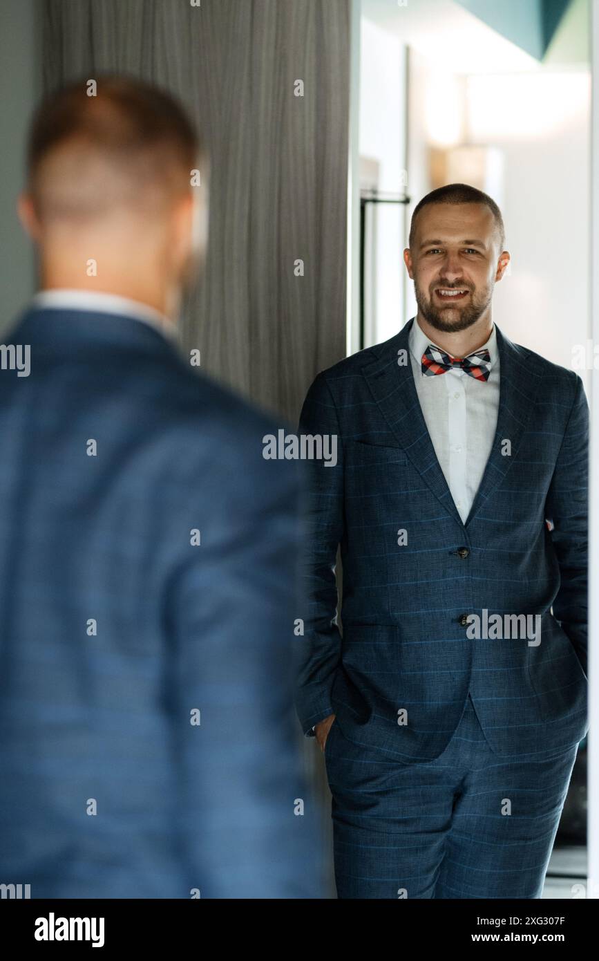 portrait of smiling groom with beard in blue color suit Stock Photo - Alamy