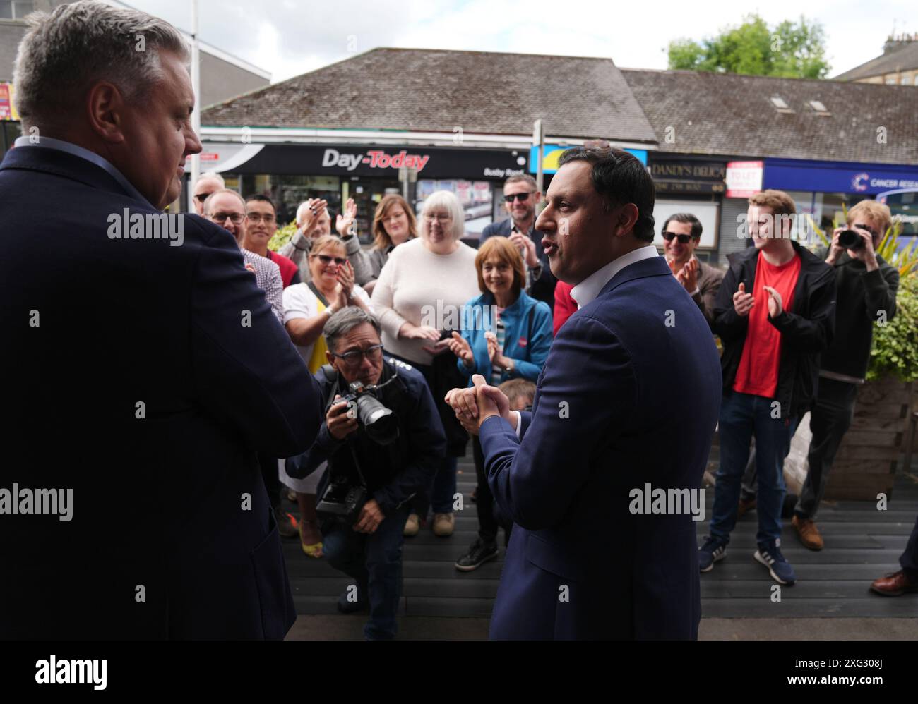 Scottish Labour leader Anas Sarwar alongside new MP Blair McDougall with activists on a walkabout in Clarkston, East Renfrewshire, following the landslide General Election victory for the Labour Party. Picture date: Saturday July 6, 2024. Stock Photo