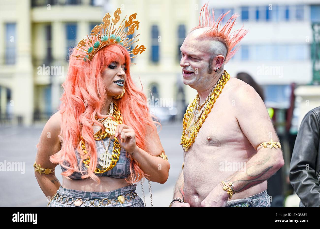 Brighton UK 6th July 2024 - Blustery weather for the annual March of the Mermaids parade  along Brighton seafront today . The annual parade is a celebration of the sea and raises awareness of Marine Conservation and keeping the water clean   : Credit Simon Dack / Alamy Live News Stock Photo