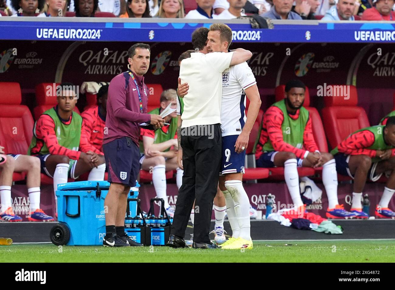 England's Harry Kane (right) speaks with manager Gareth Southgate after ...