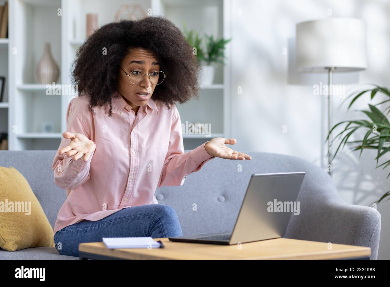 Remote work confused black hi-res stock photography and images - Alamy