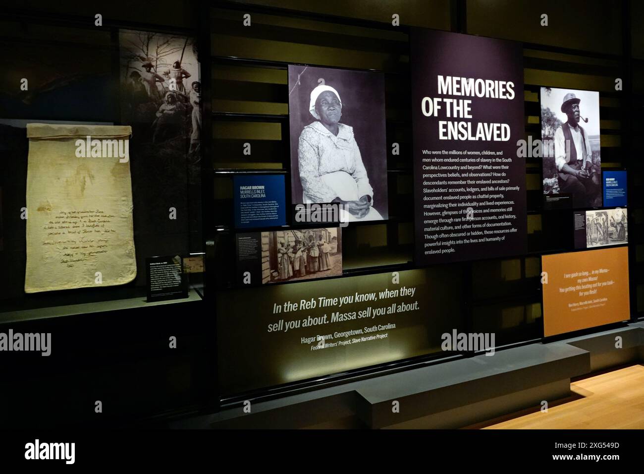 A display featuring the Memories of the Enslaved at the International African American Museum at Gadsden’s Wharf in Charleston, South Carolina. The museum tells the story of slavery in the United States. Stock Photo