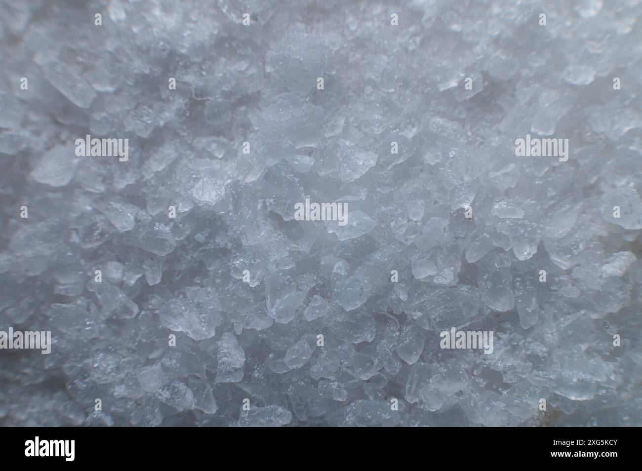 Coarse white iodized salt detailed background texture macro close up