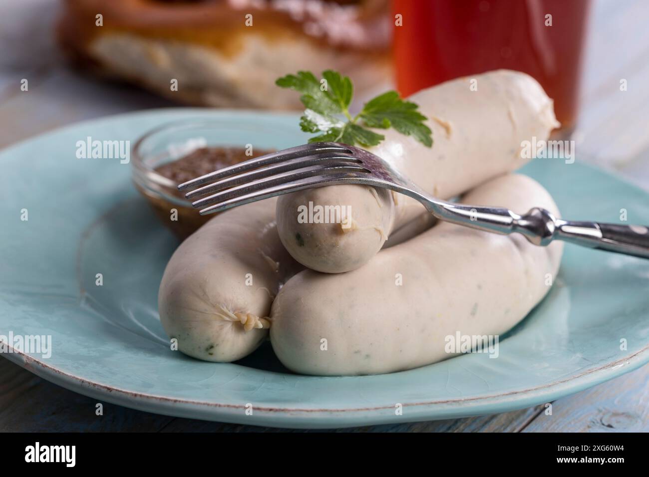 Bavarian white sausages with pretzel Stock Photo