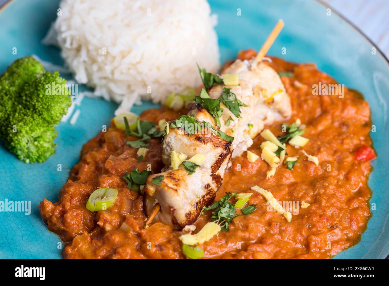 Indian chicken curry with rice Stock Photo - Alamy