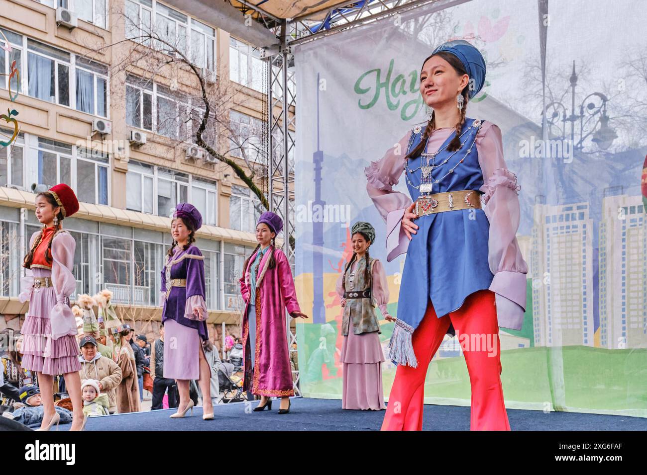 Almaty, Kazakhstan - March 21, 2024: Cute asian young women showing