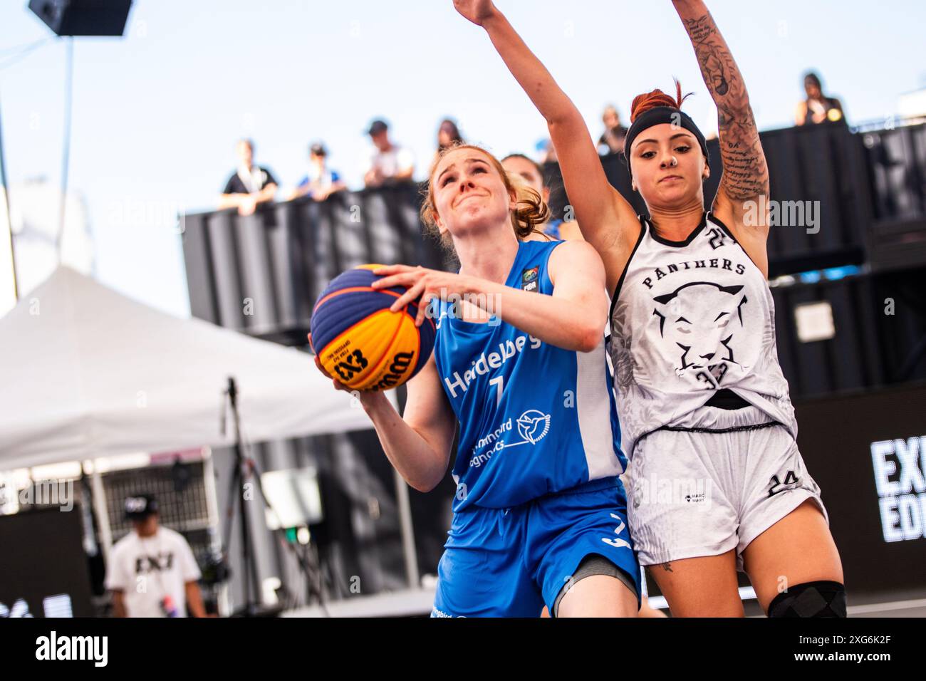 Edmonton, Canada. 05th July, 2024. Barcelona Panther Ari Geli (R) attempts to block Heidelberg's Lea Wolff (L) on a drive to the net during the FIBA 3X3WS Tour stop game between Barcelona Panthers and Heidelberg at Edmonton's Ice District. Final scores; Barcelona Panthers 21:14 Heidelberg. Credit: SOPA Images Limited/Alamy Live News Stock Photo