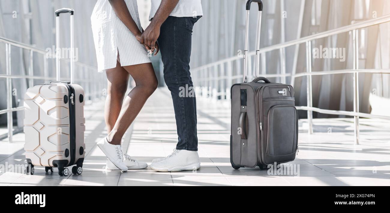 Couple Holding Hands Before Departure at Airport Terminal, Cropped ...