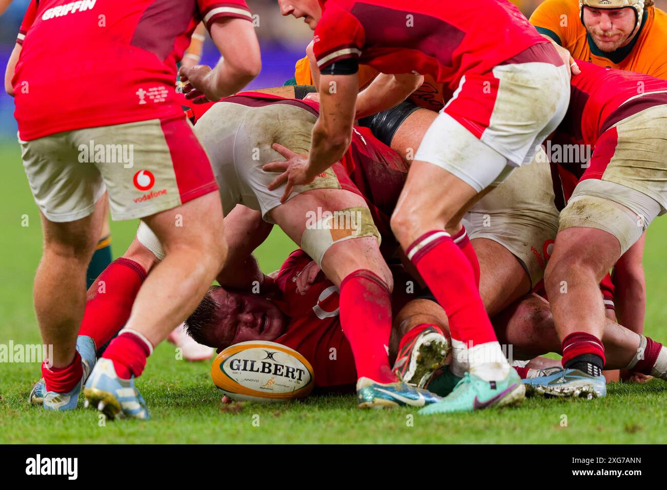 Dewi Lake of Wales passes the ball after being tackled during the Men's Rugby International Test match between Australia and Wales at Allianz Stadium Stock Photo