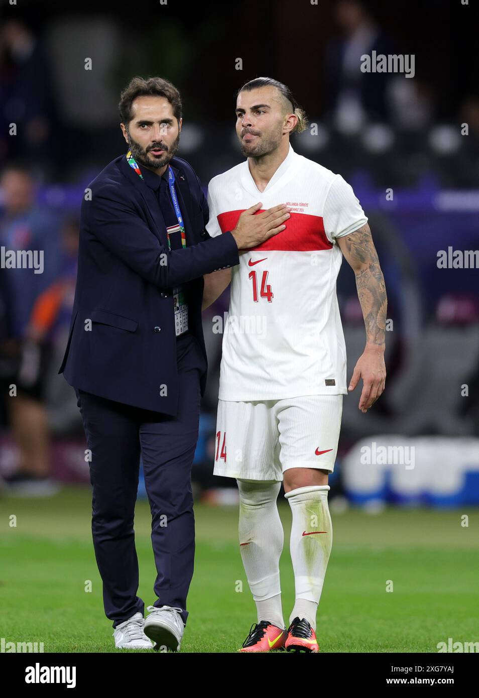 BERLIN, GERMANY - JULY 06: Hamit Altintop, Board member of the Turkish Football Association with AbdŸllekrim Bardakci of Turkiye  after the UEFA EURO 2024 quarter-final match between Netherlands and TŸrkiye at Olympiastadion on July 06, 2024 in Berlin, Germany. © diebilderwelt / Alamy Stock Stock Photo