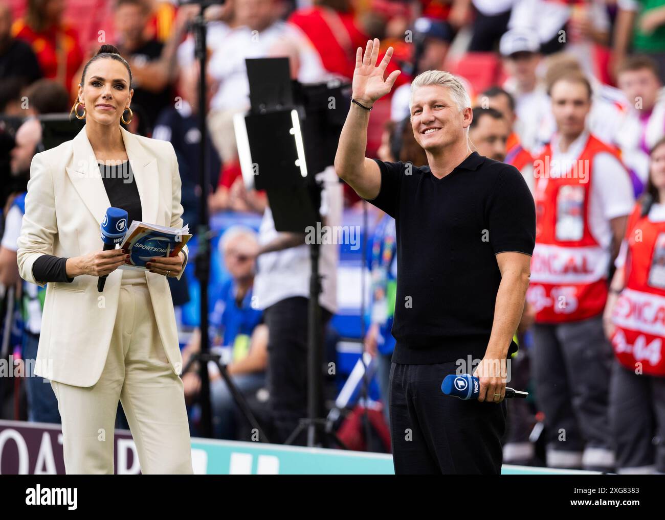 Stuttgart, MHPArena 05.07.2024: Bastian Schweinsteiger and Esther ...