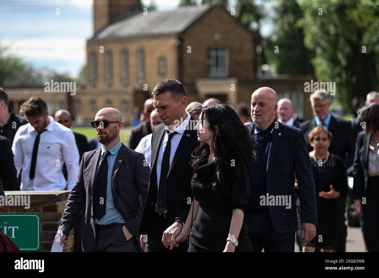 Kevin Sinfield his wife Jayne Sinfield leave Pontefract Crematorium after Rob CBE Burrow Funeral at Pontefract Crematorium, Pontefract, United Kingdom, 7th July 2024  (Photo by Mark Cosgrove/News Images) in Pontefract, United Kingdom on 7/7/2024. (Photo by Mark Cosgrove/News Images/Sipa USA) Stock Photo