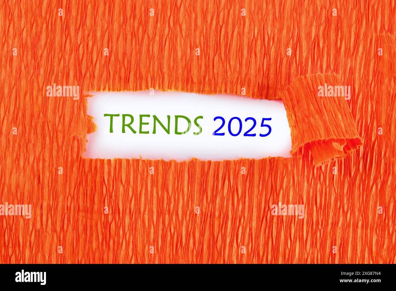 2025 business marketing trends and planning change concept. TRENDS 2025 on white under the paper