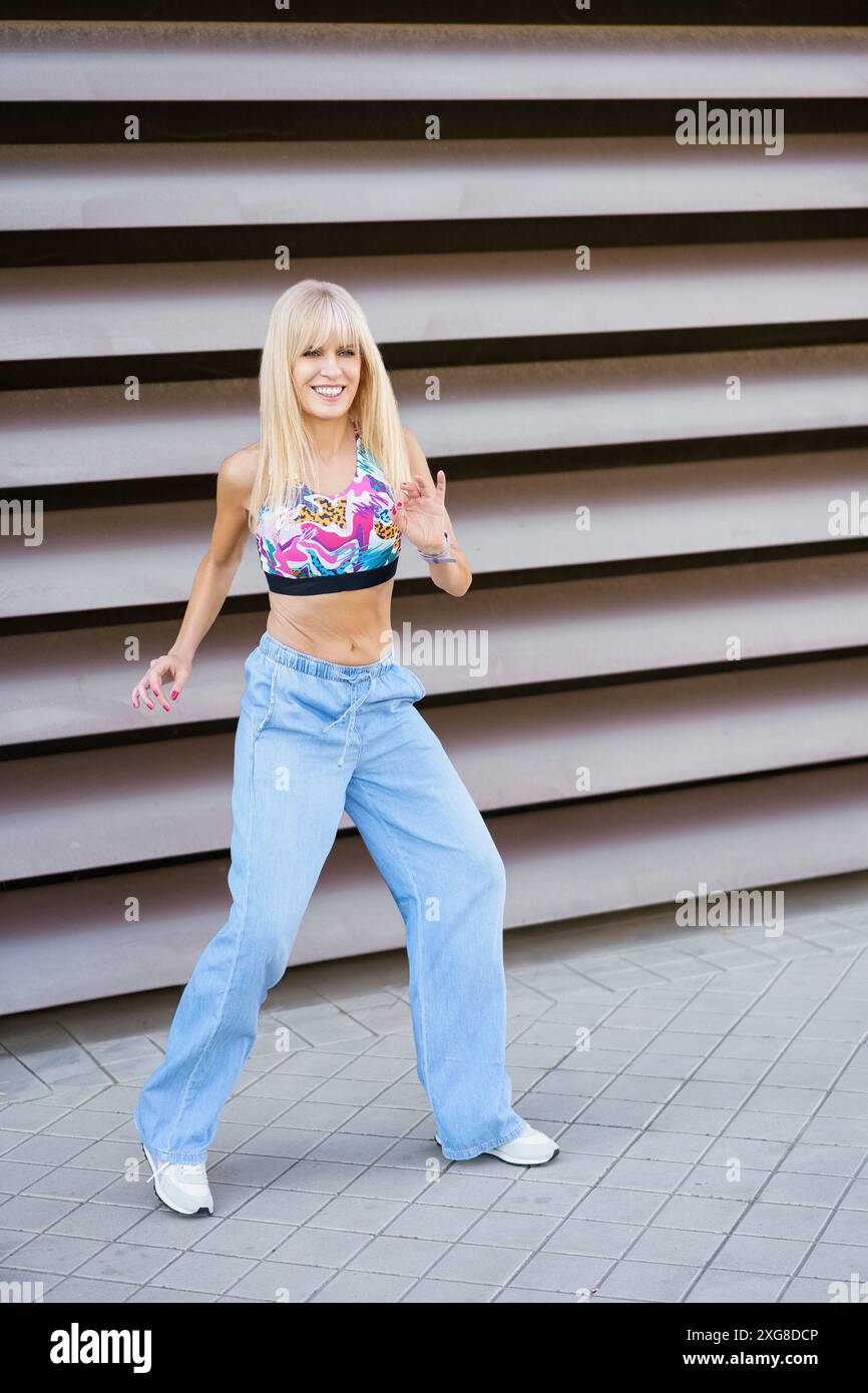 Modern dancer performing in an urban space Stock Photo