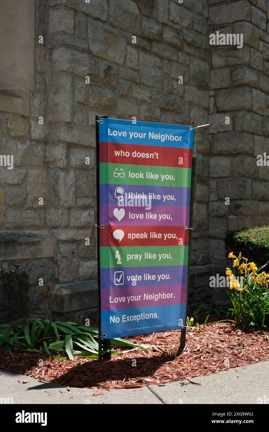 Sign promoting inclusion and diversity outside Saint Paul's Episcopal Church in Flint Michigan USA Stock Photo