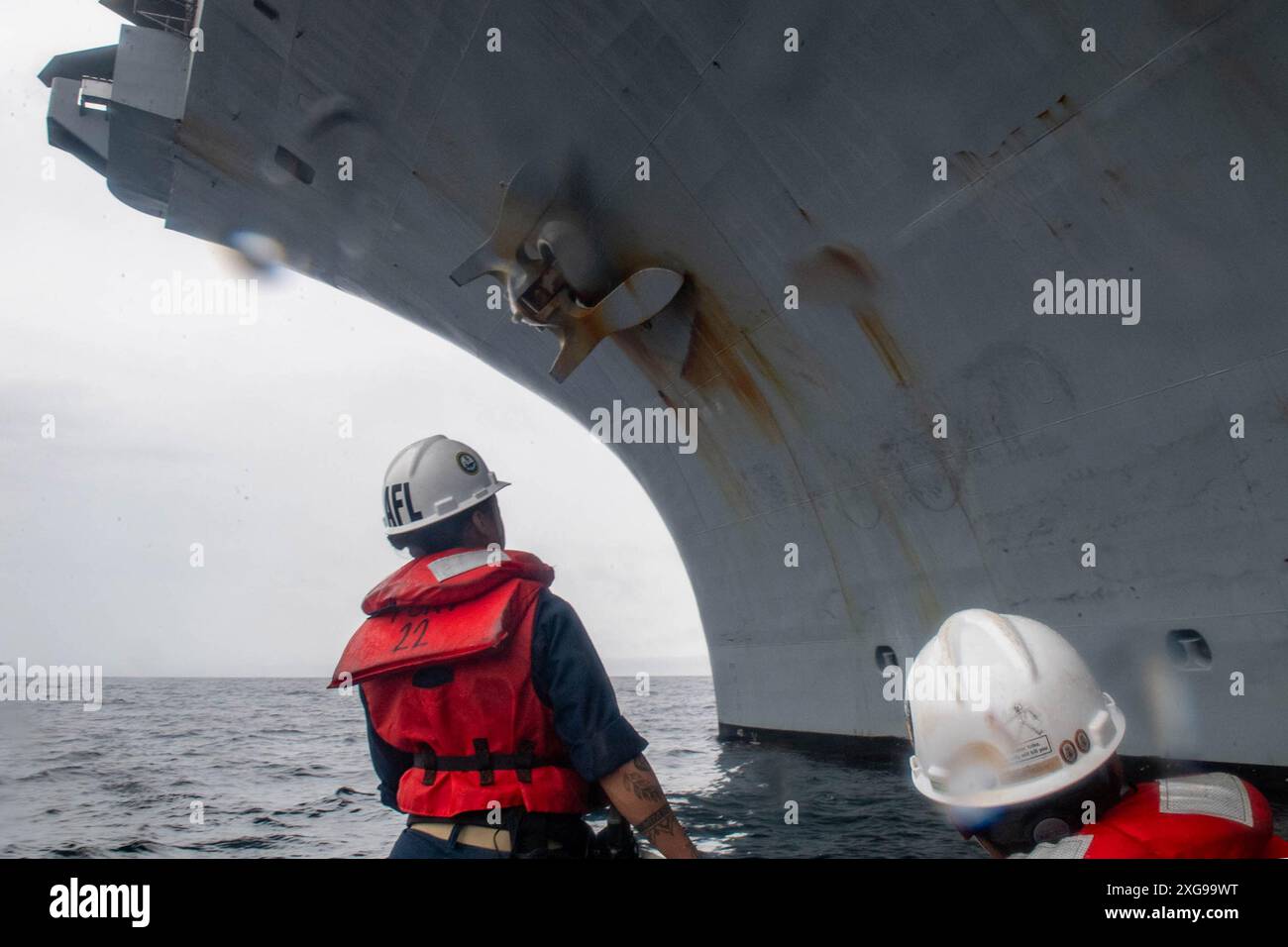 EAST CHINA SEA (June 27, 2024) U.S. Navy Lt. j.g. Thania Lopez, left ...