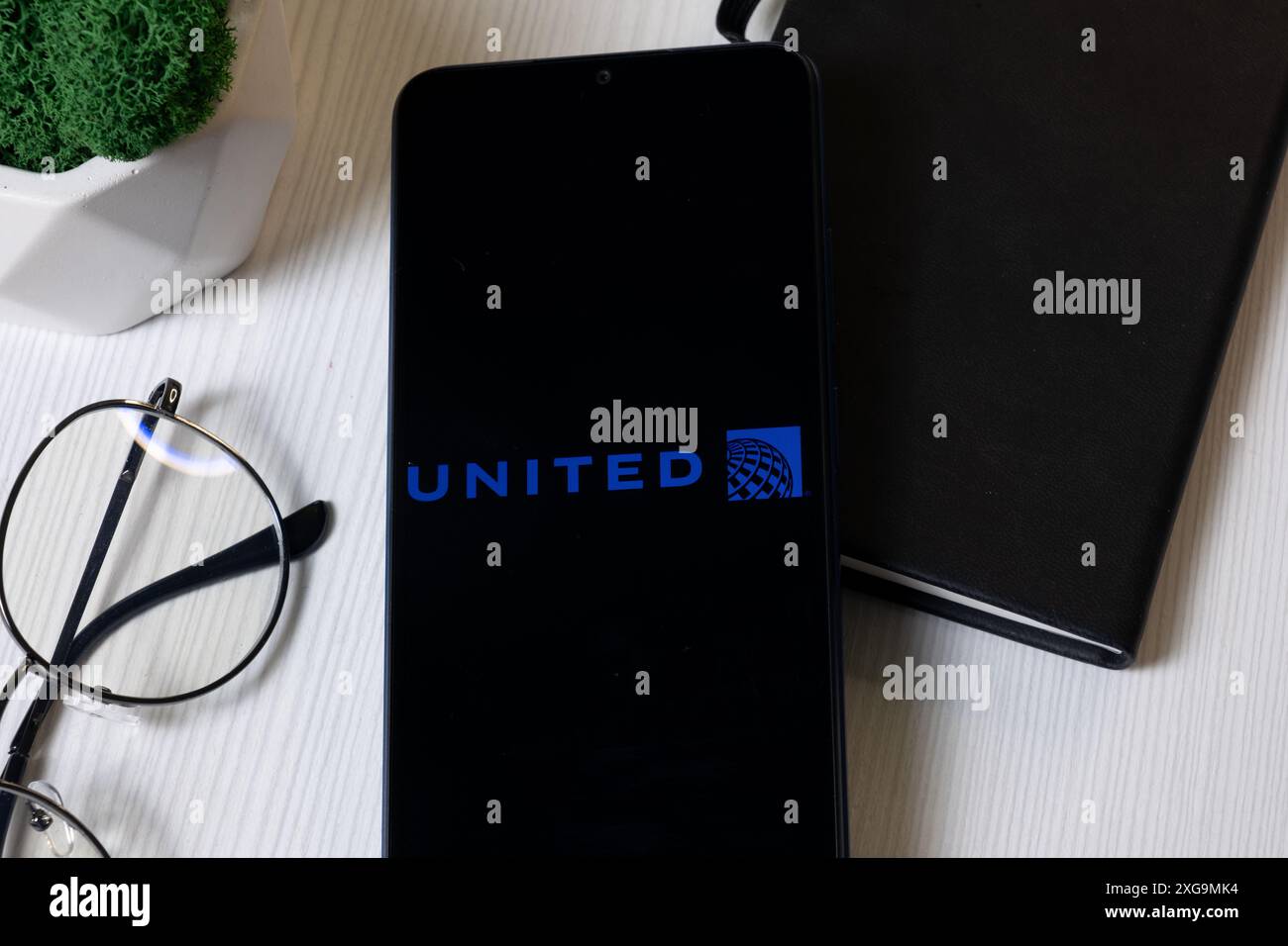 New York, USA - 1 June 2024: United Airlines Holdings Logo on Phone Screen, Company Icon. Stock Photo