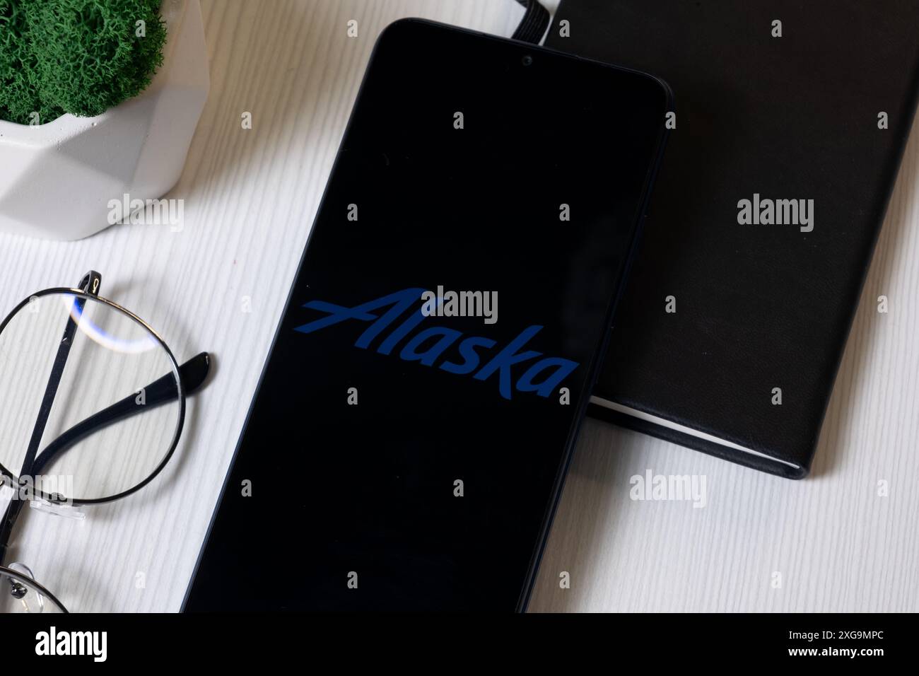 New York, USA - 1 June 2024: Alaska Airlines Logo on Phone Screen, Company Icon. Stock Photo