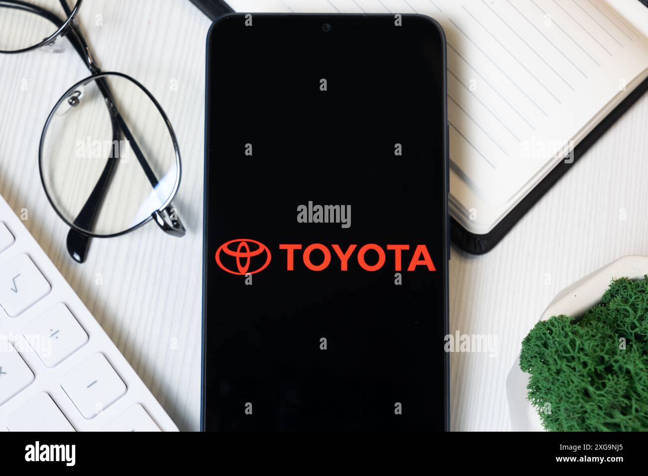 New York, USA - 1 June 2024: Toyota Motor Logo on Phone Screen, Company Icon. Stock Photo