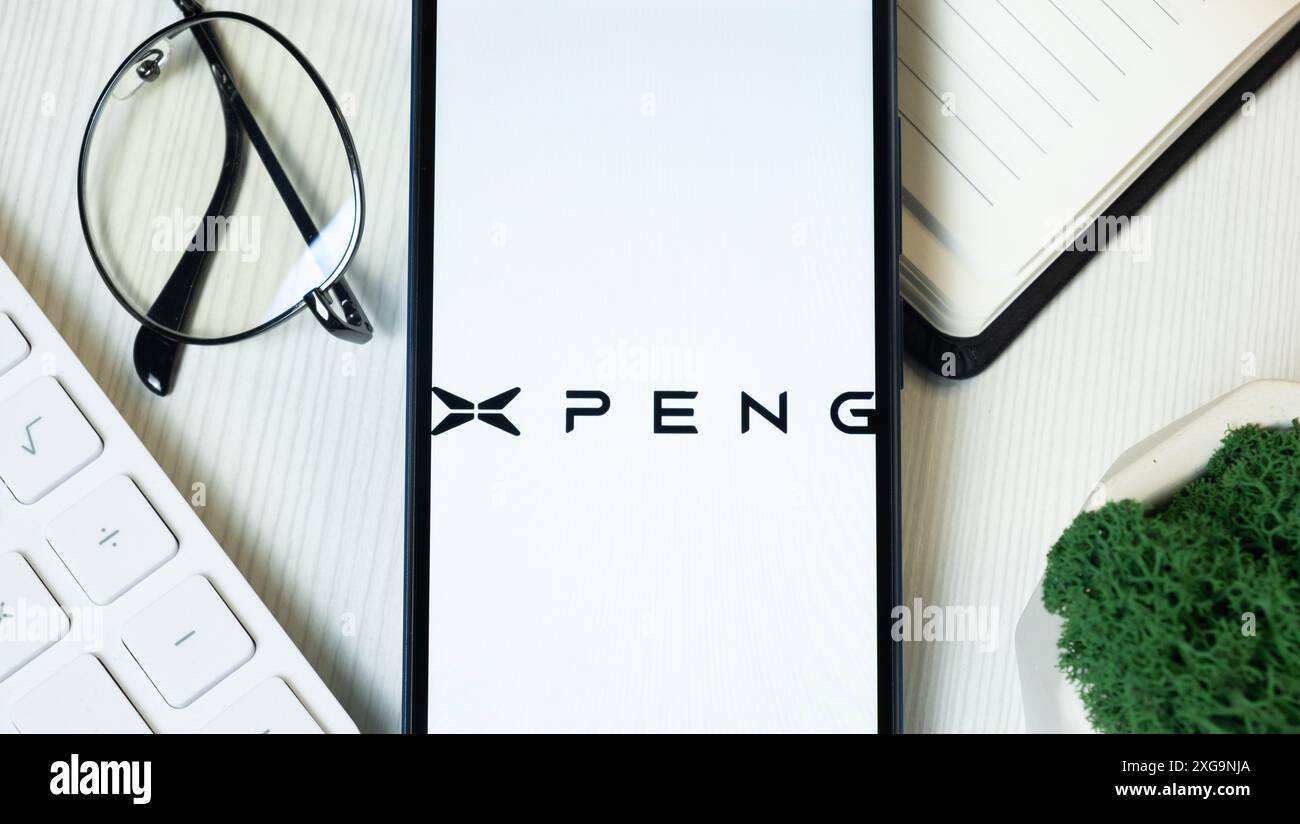 New York, USA - 1 June 2024: XPeng Logo on Phone Screen, Company Icon. Stock Photo