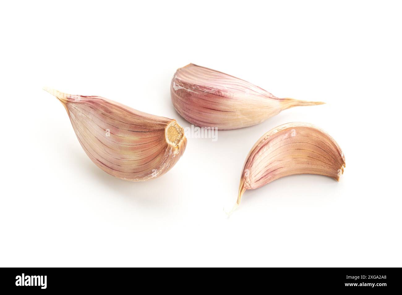 Garlic cloves isolated on white background Stock Photo