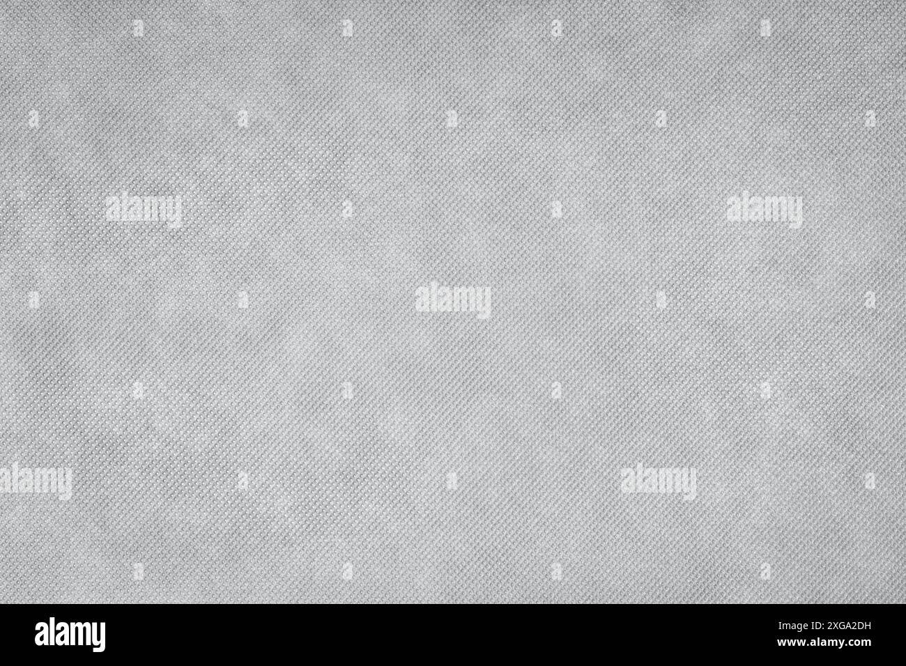 Gray textile background texture. Mesh seamless dot fabric Stock Photo