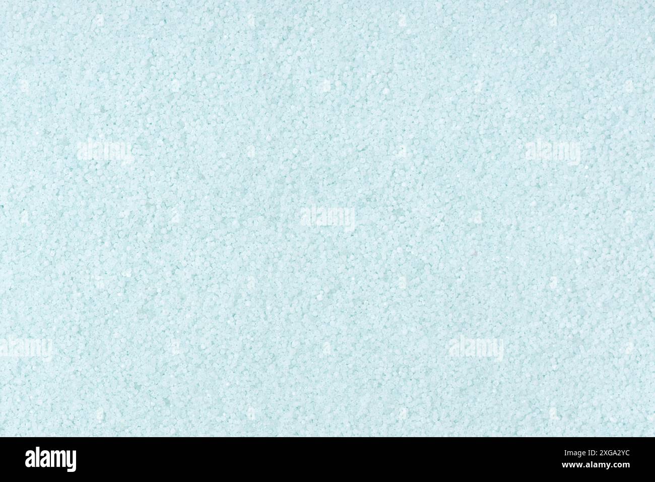 Turquoise colored sand background texture. Full frame Stock Photo