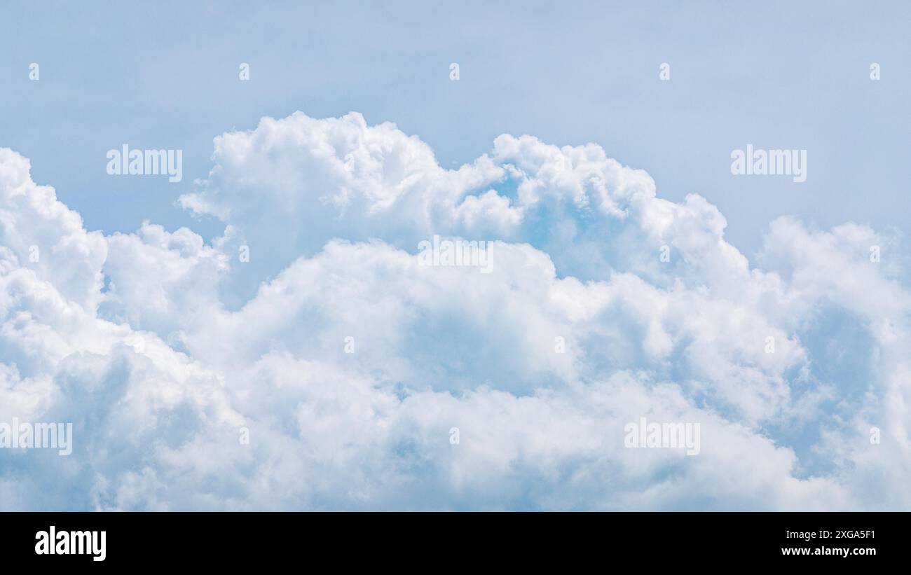 Light blue (cumulus) clouds texture, wide summer sky background Stock Photo