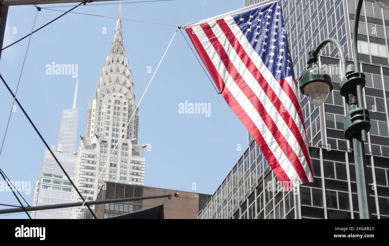 New York, american flag waving. Chrysler building. Manhattan midtown 42 ...