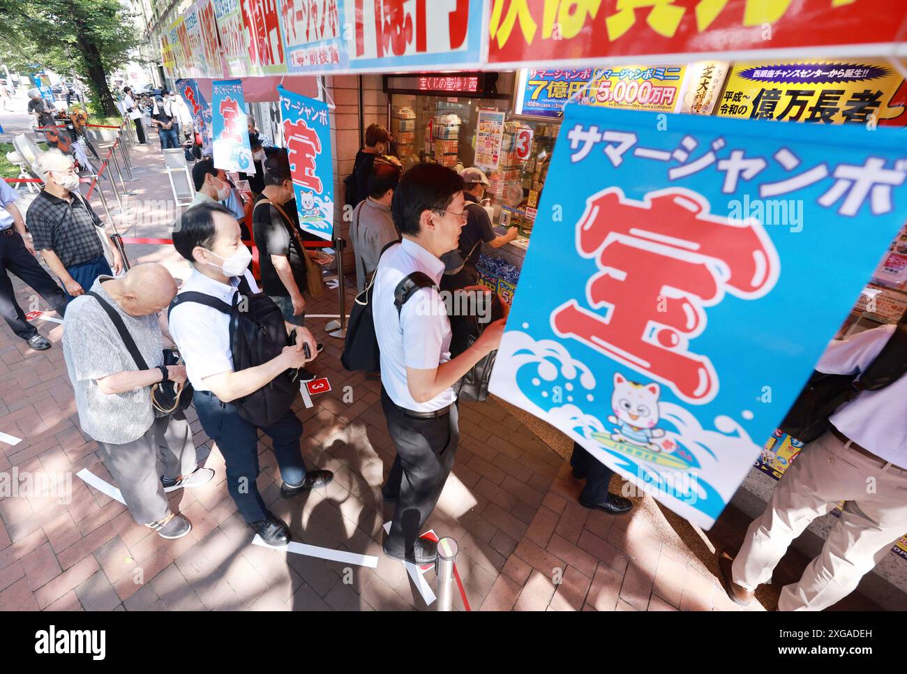 People make lines to buy the Summer Jumbo Lottery in Tokyo on July 8th,  2024. The top prize money of one of the biggest lotteries in Japan is 700 million  yen (about