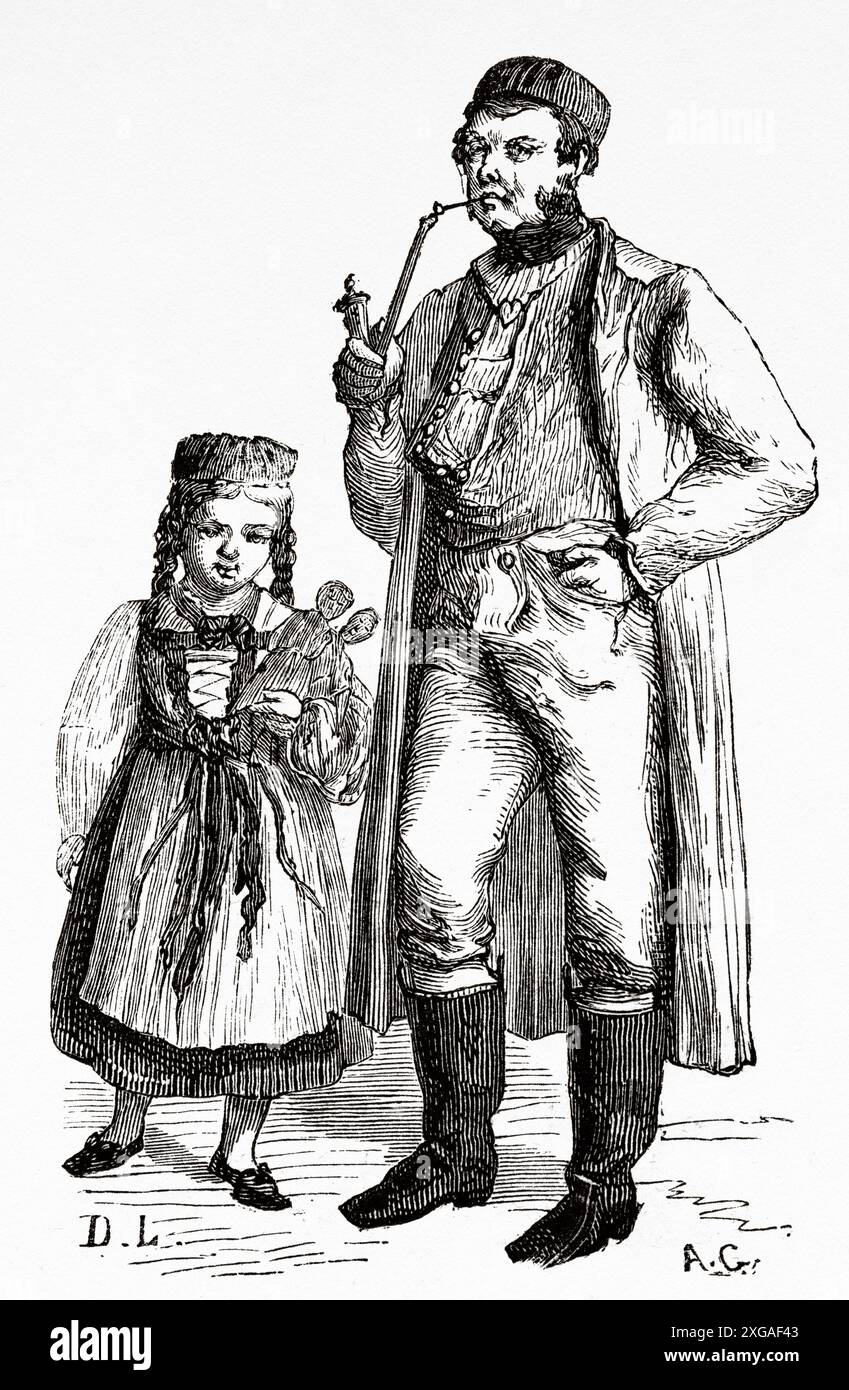 Peasant man dressed in traditional costume smoking a traditional ...