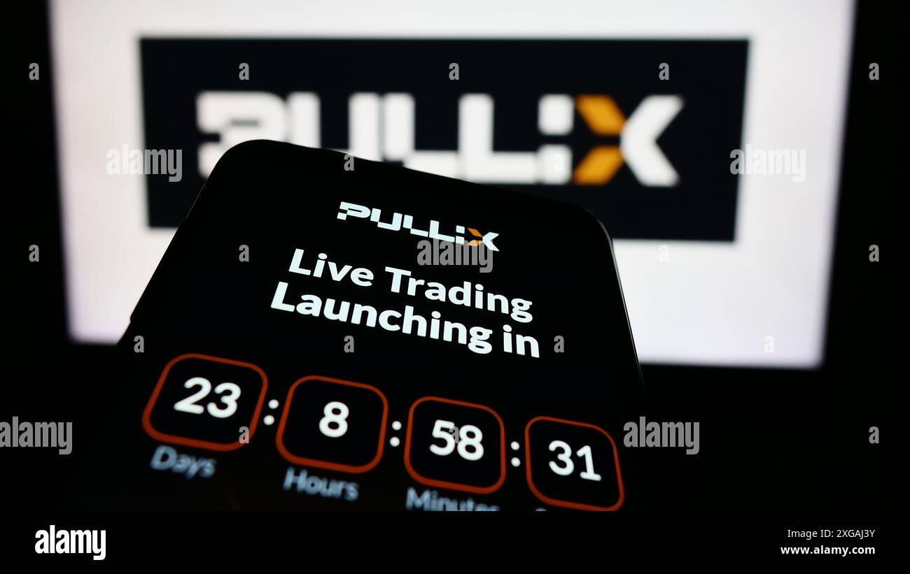 Mobile phone with website of crypto exchange company Pullix Prime Trading  Ltd. in front of business logo. Focus on top-left of phone display Stock  Photo - Alamy