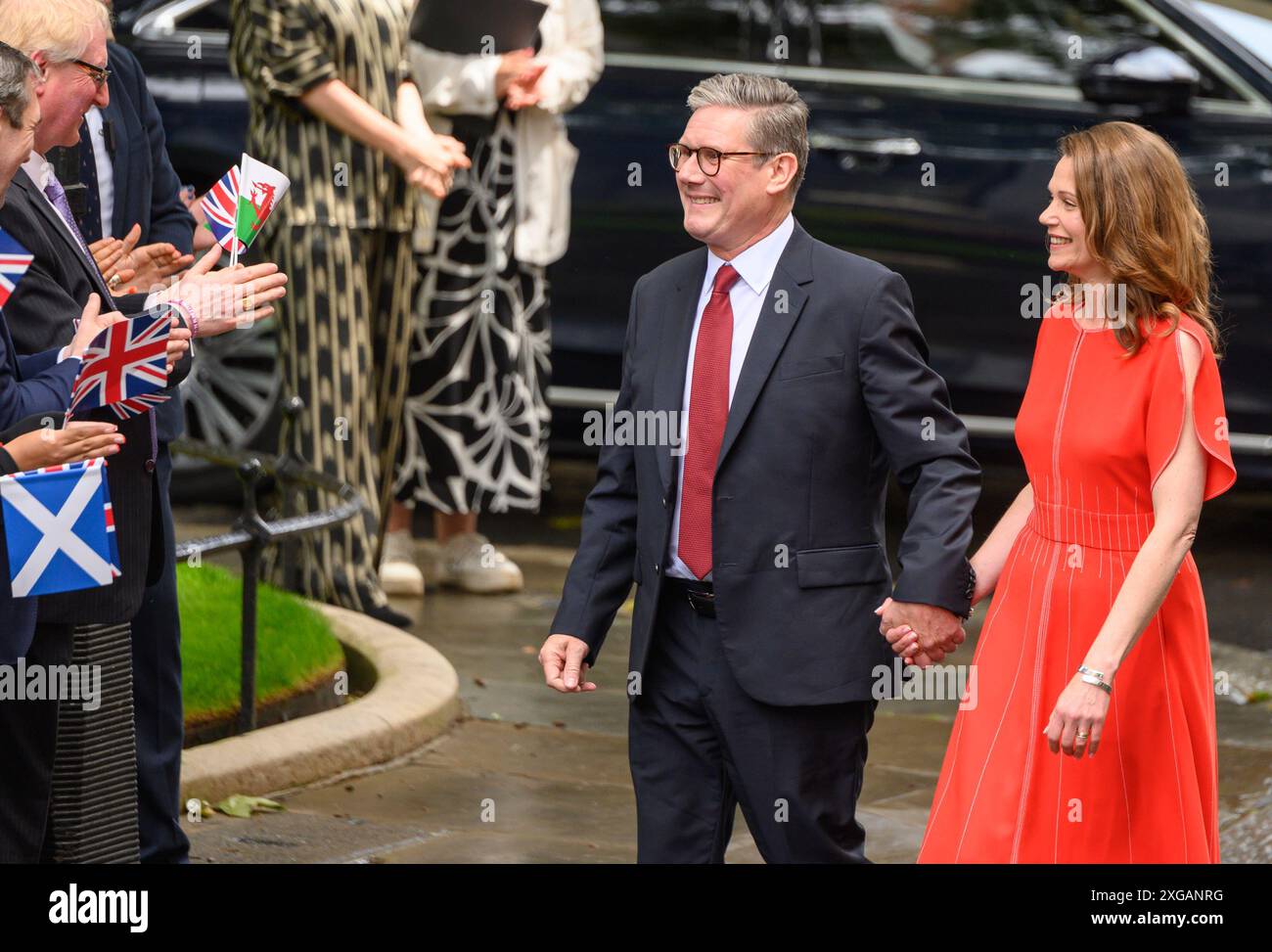 Sir Keir Starmer with his wife Victoria greeting onlookers in Downing