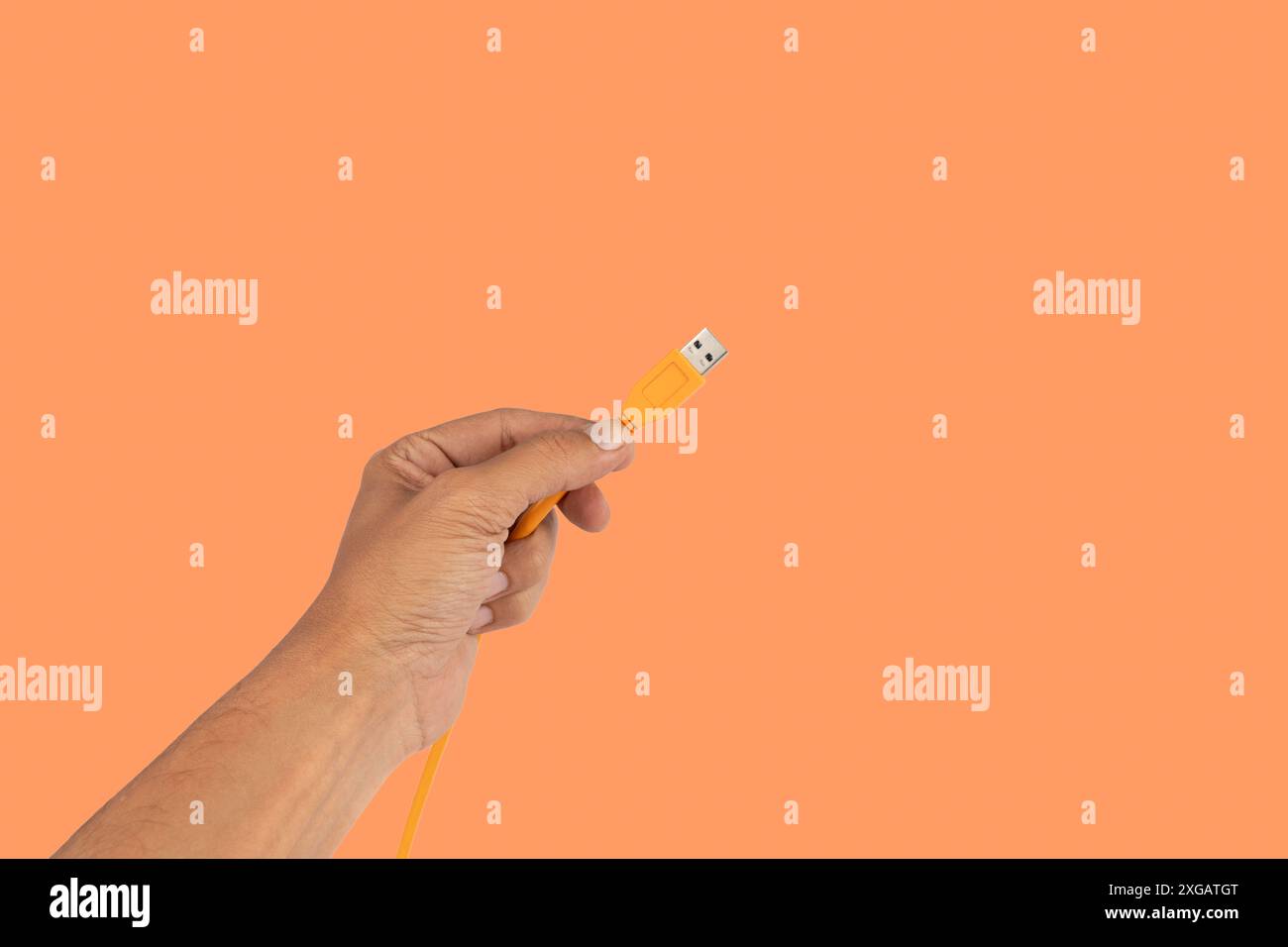 Human hand holding orange hi-res stock photography and images - Alamy