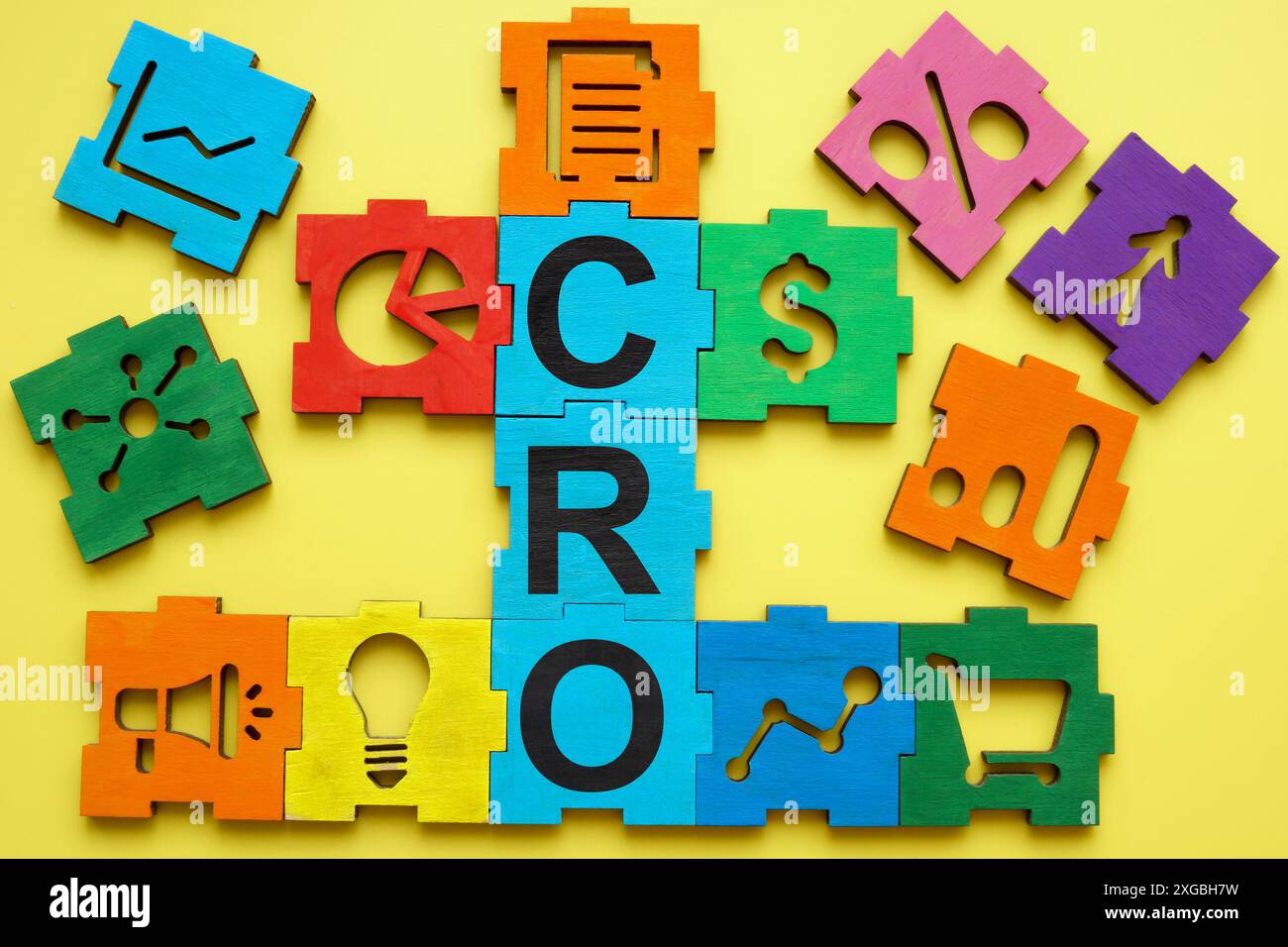 Colored puzzle with abbreviation CRO Conversion Rate Optimization. Stock Photo