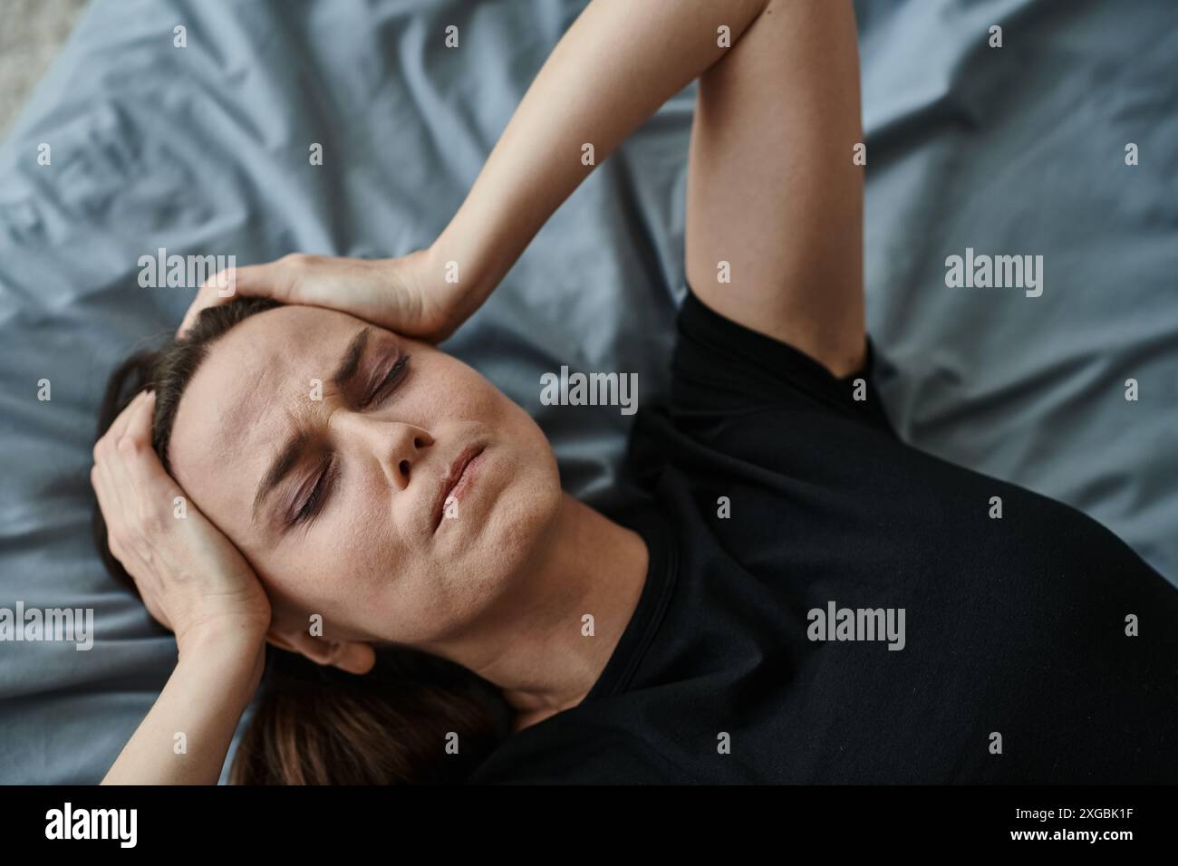 Aged woman lying in bed hi-res stock photography and images - Alamy